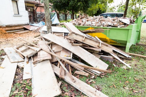 Construction site with waste materials being cleared