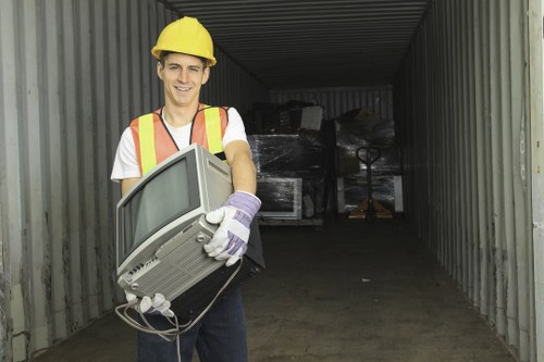 Professional team conducting garage clearance in Neasden.